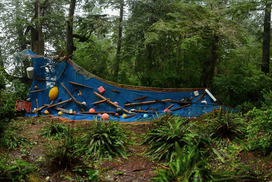 <em>Swept Away</em>, an installation at the Tofino Botanical Gardens, was assembled with fishing net and tsunami debris. Photo by Chris Pouget