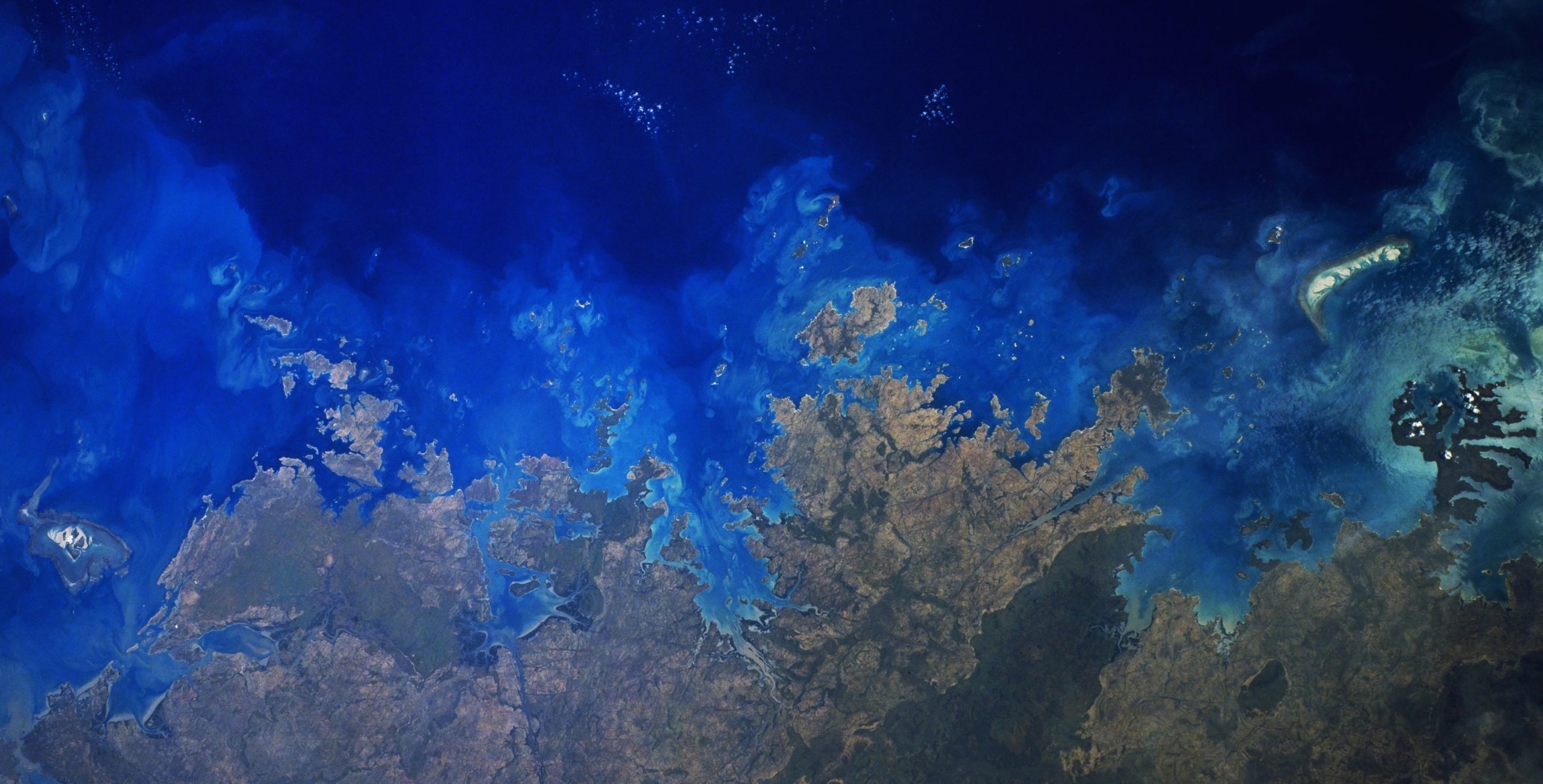 Resilient corals were discovered around a number of the small islands that make up the Bonaparte Archipelago off Western Australia. Photo by NASA