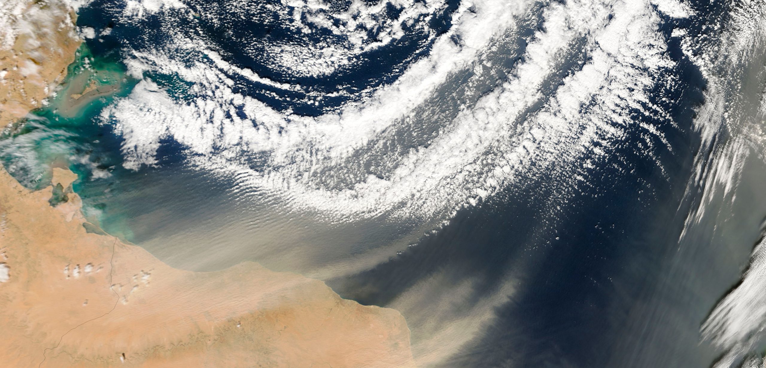 A plume of dust blows off the coast of Africa. Photo by Stocktrek Images, Inc./Alamy Stock Photo