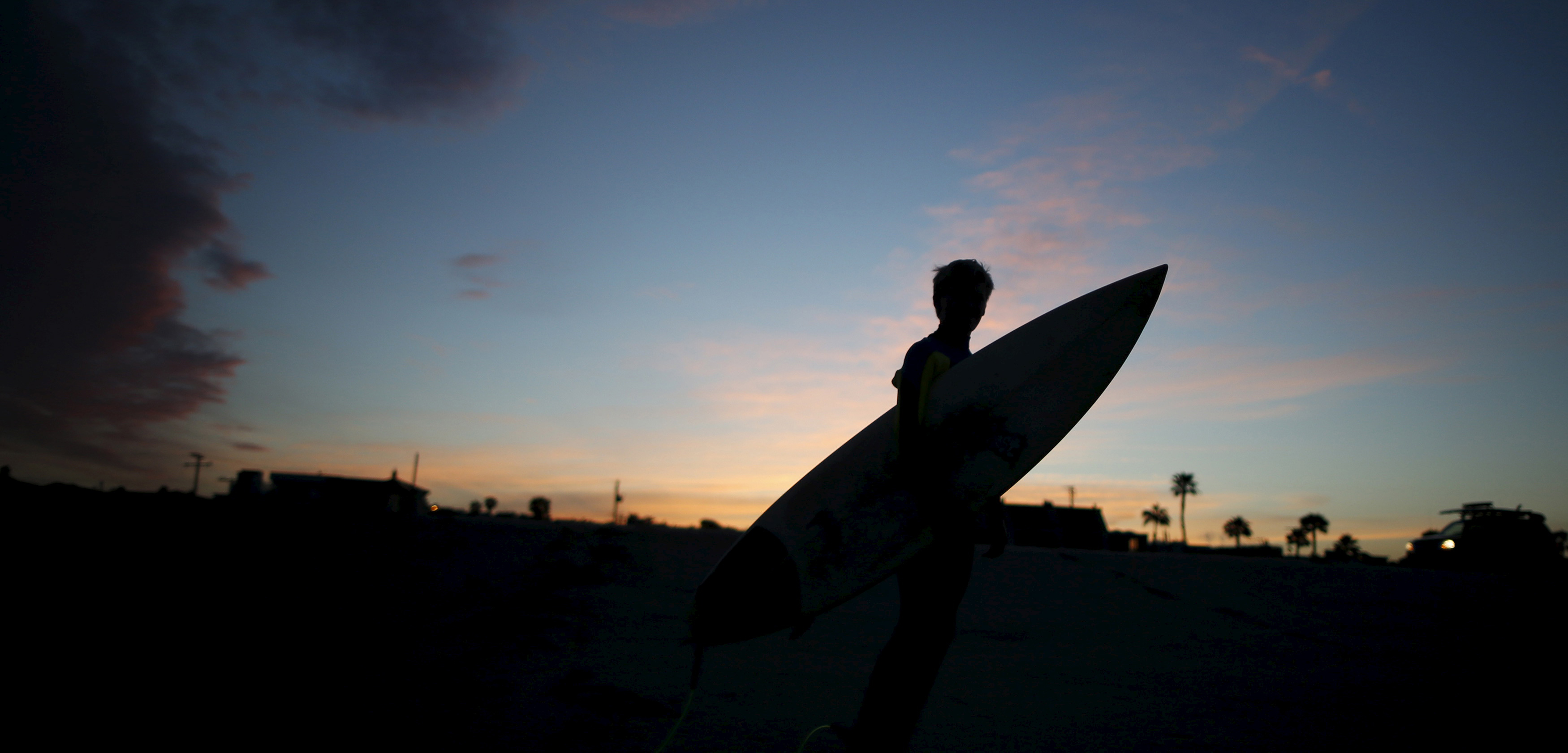 A 13-year-old surfer in California. Photo by Lucy Nicholson/Reuters/Corbis