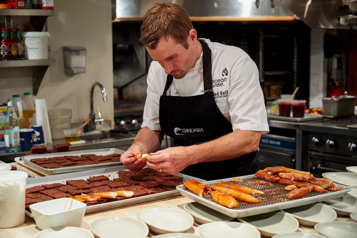 Chef Ned Bell carefully places fillets of farmed sablefish atop seaweed-laced brownies