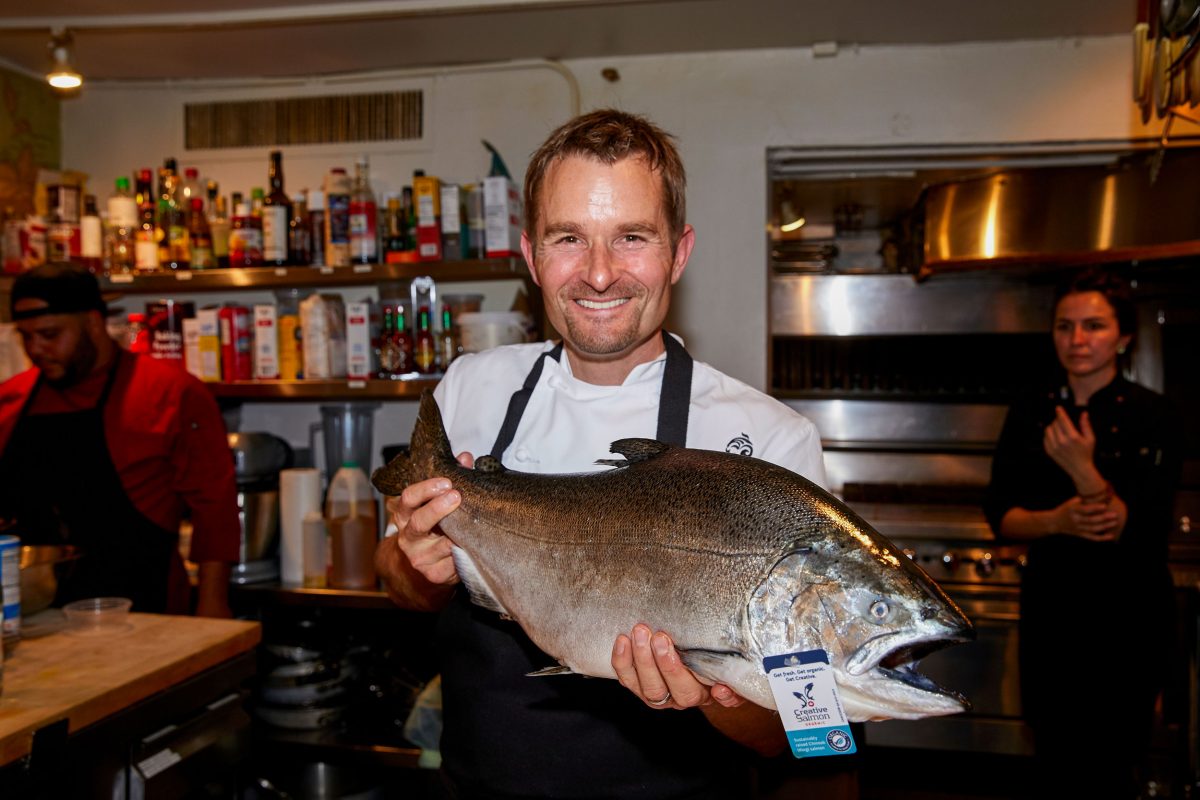 Bell shows off a sablefish farmed by Gindara, a Canadian company based on Vancouver Island, British Columbia. Photo courtesy of the James Beard Foundation
