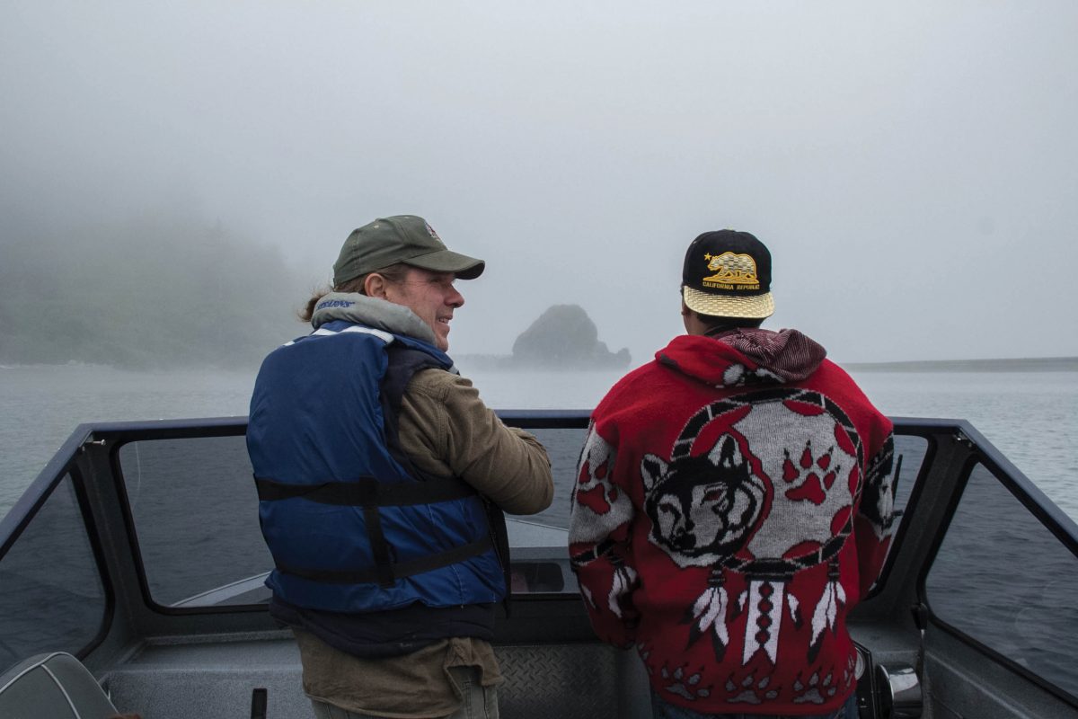 Yurok Tribe Fisheries Department Director Dave Hillemeier, left, and technician Robert Ray on the Klamath River on the Yurok Reservation. Photo by Jolene Nenibah Yazzie/High Country News