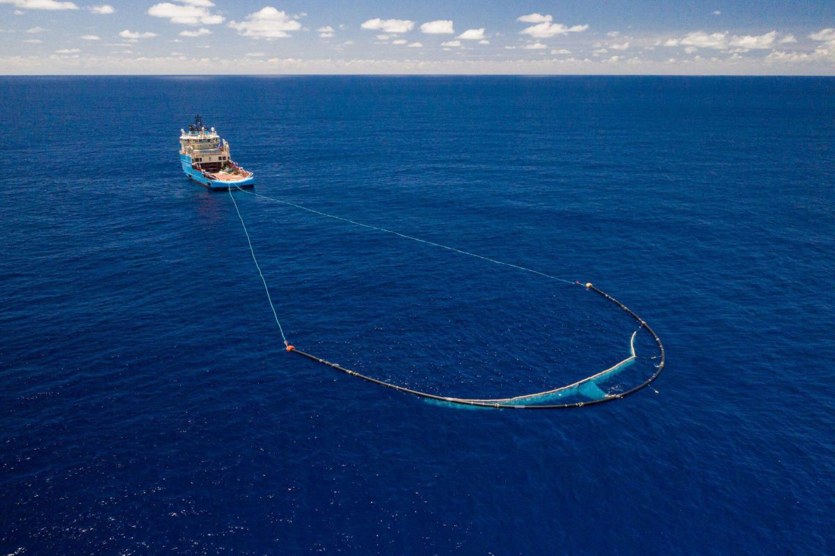 The Ocean Cleanup ship with boom