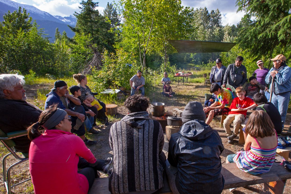 A group from the Wuikinuxv and Heiltsuk First Nations spends time in the backcountry on the British Columbia coast sharing stories and experiences
