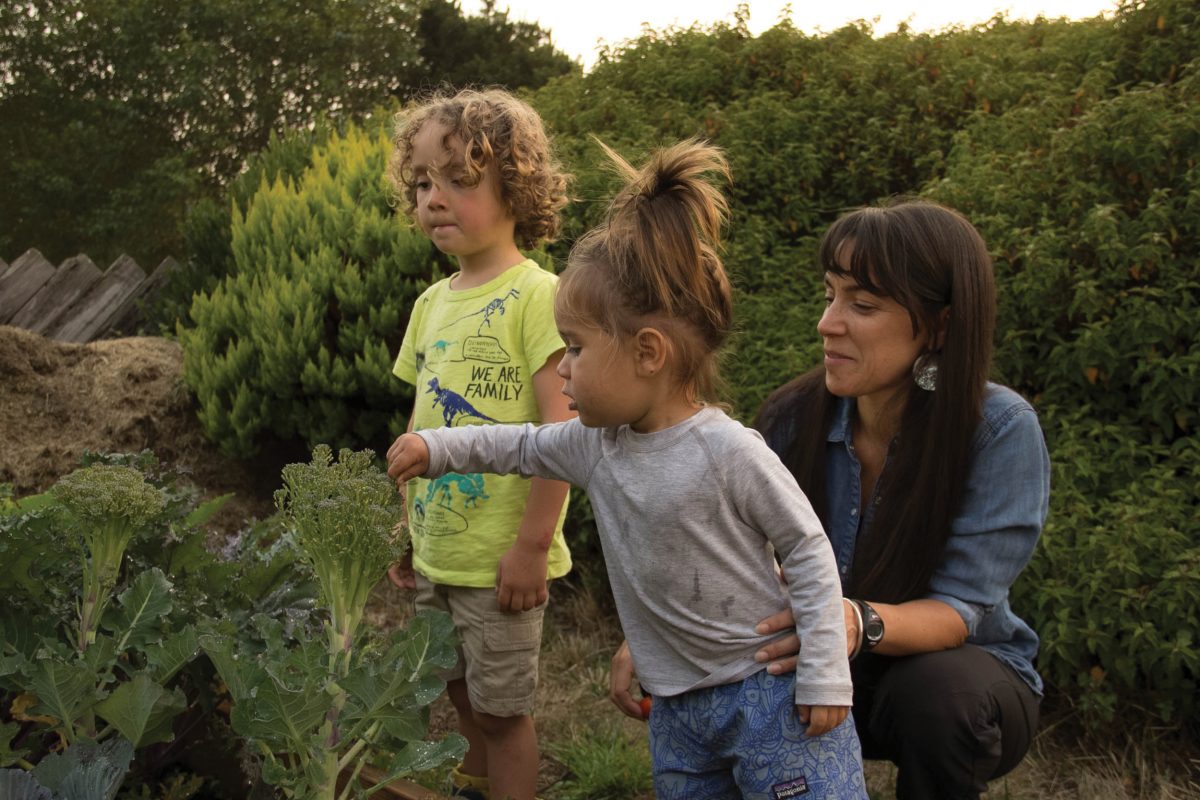 Amy Cordalis with sons Brooks and Keane in their backyard garden in McKinleyville, California