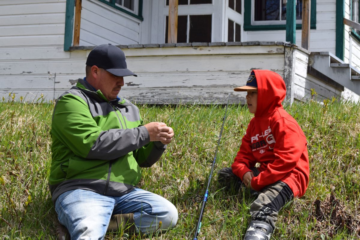 Rocky St-Onge and his son prepare to protest the private ownership of fishing grounds on the Moisie River by fishing from the restricted waters