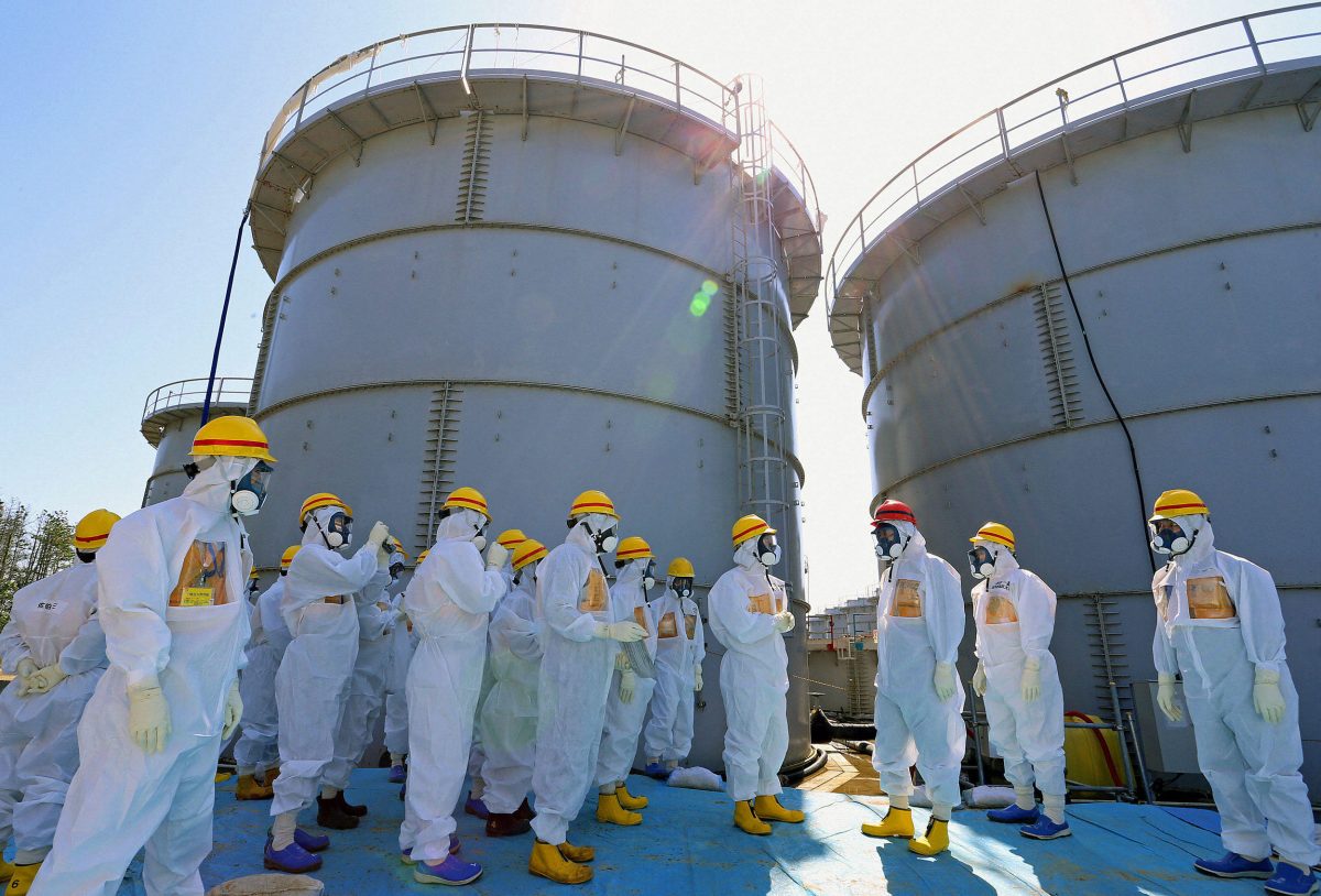 Prime Minister Shinzo Abe inspects the Fukushima power plant