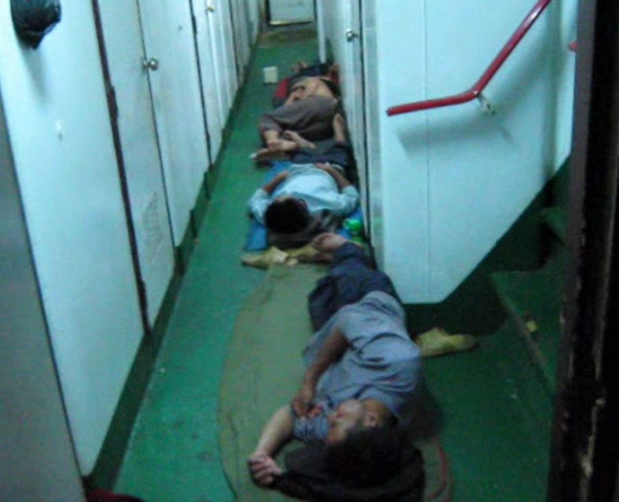 People sleeping in the hall on a fishing vessel