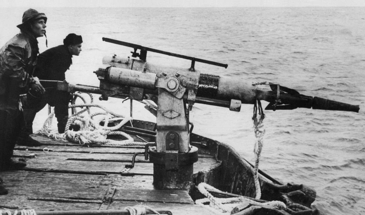 Russian whalers at harpoon gun in the 1960s