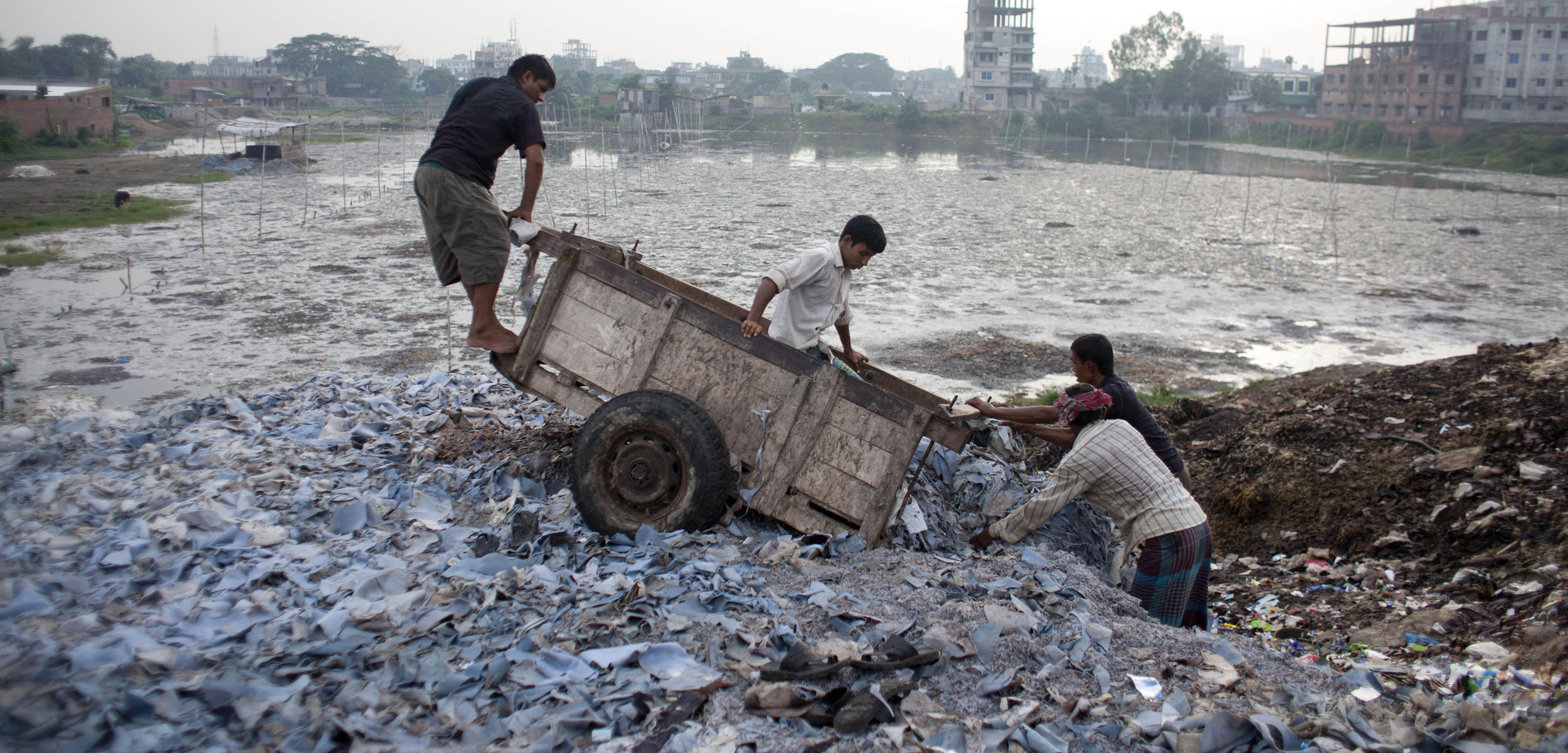 In Bangladesh, leather factories long dumped their toxic wastewater into the Buriganga River and discarded their leather scraps along its banks. Today, parts of the river are almost dead. Photo by Zuma Press, Inc./Alamy Stock Photo