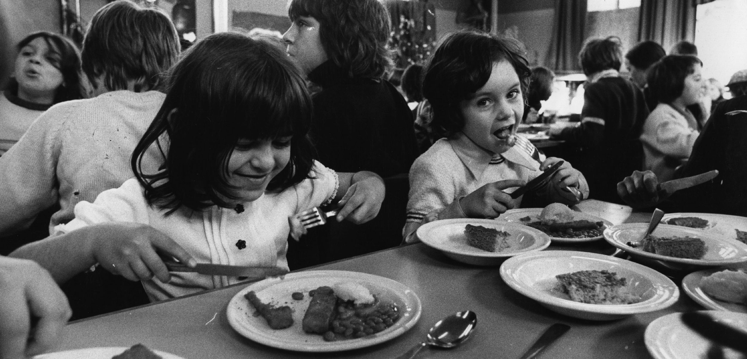 British schoolchildren eating fish sticks in 1974