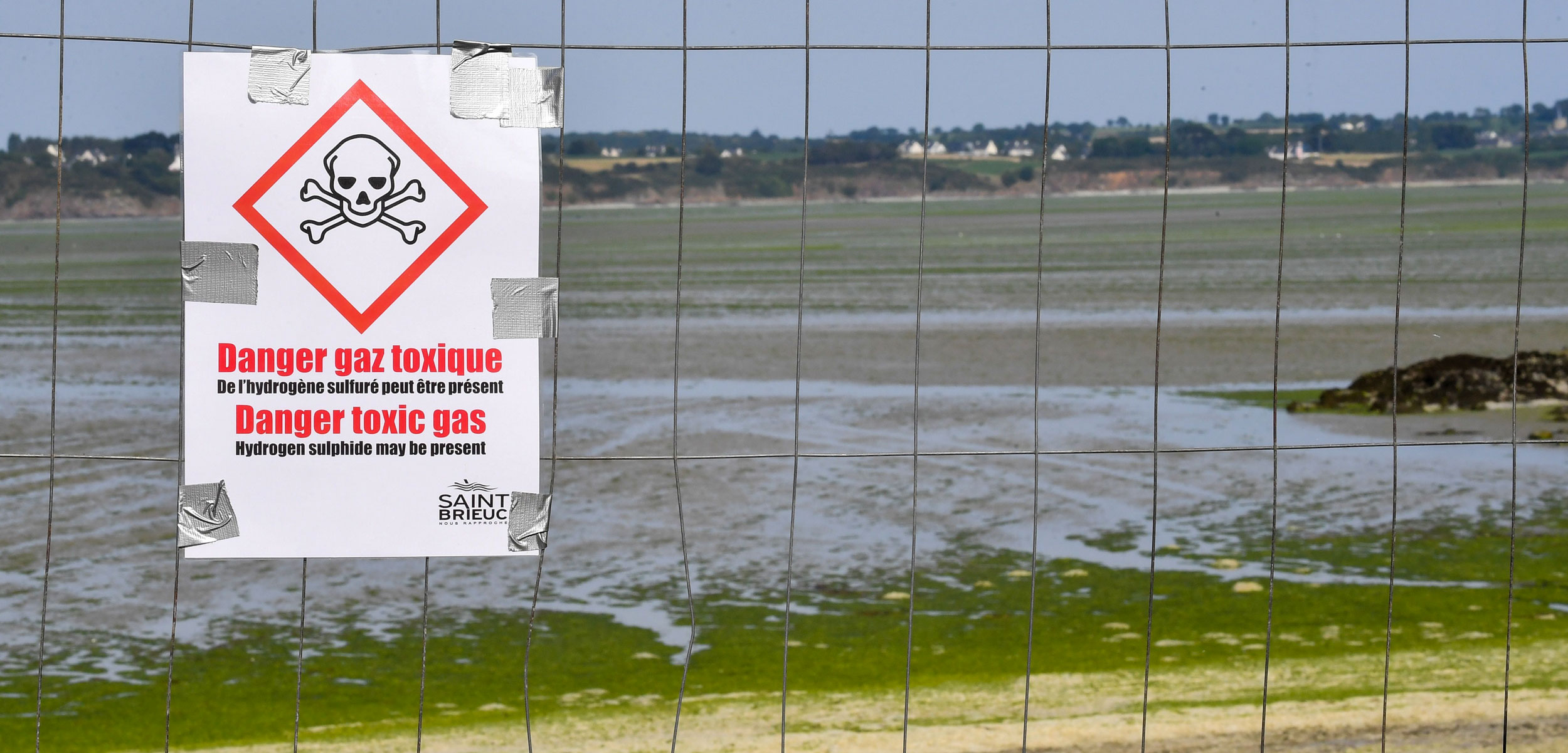 Danger Toxic Gas sign on beach in Brittany, France