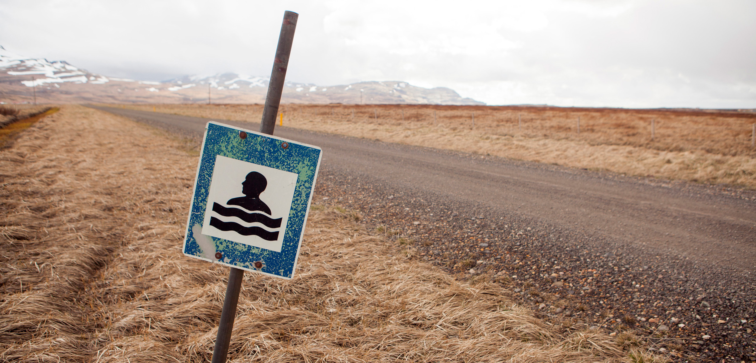 A sign along a road in western Iceland lets people know a pool is nearby. Every Icelandic community has a public pool and swimming lessons are mandatory for children in grades one through 10. Photo by Egill Bjarnason