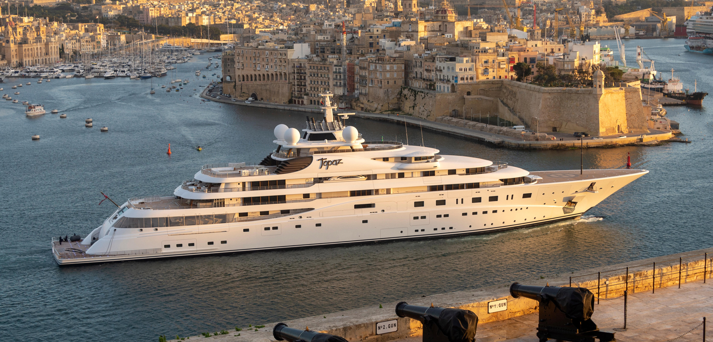 A privately owned megayacht enters the harbor at Valletta, Malta