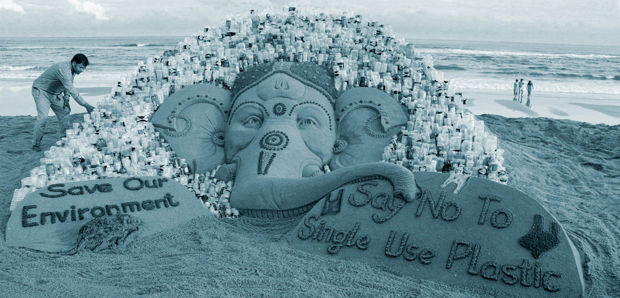 Sudarsan Pattnaik and his sand sculpture of Ganesha
