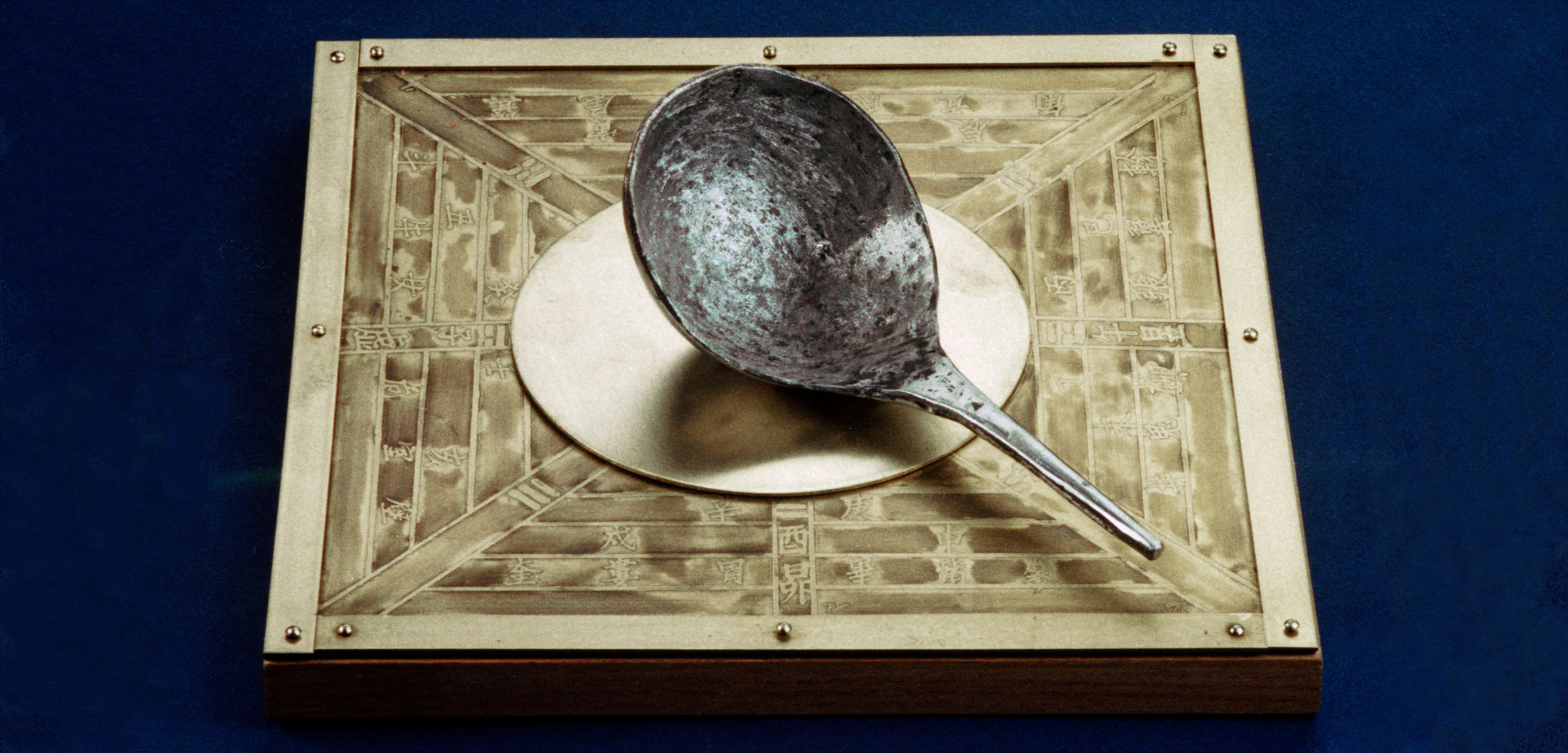 modern replica of a south pointing spoon, an early compass