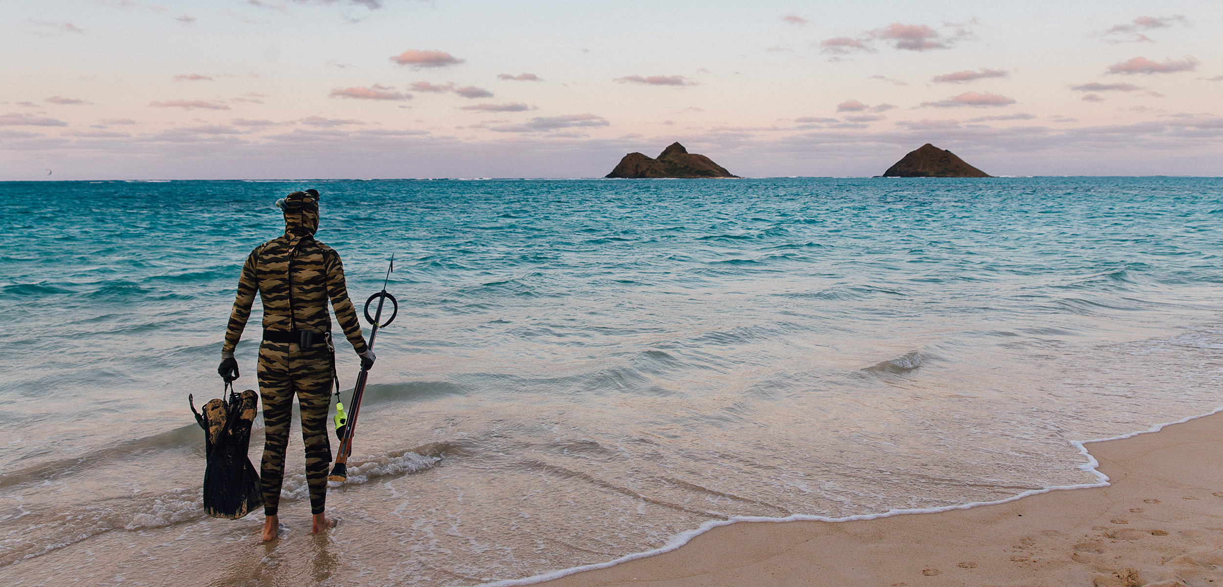 For some Hawaiian residents like Kellen Parenzin of O‘ahu, spearfishing is about participating in and forging a spiritual connection to the ecosystem beneath the waves. Photo by Meagan Suzuki