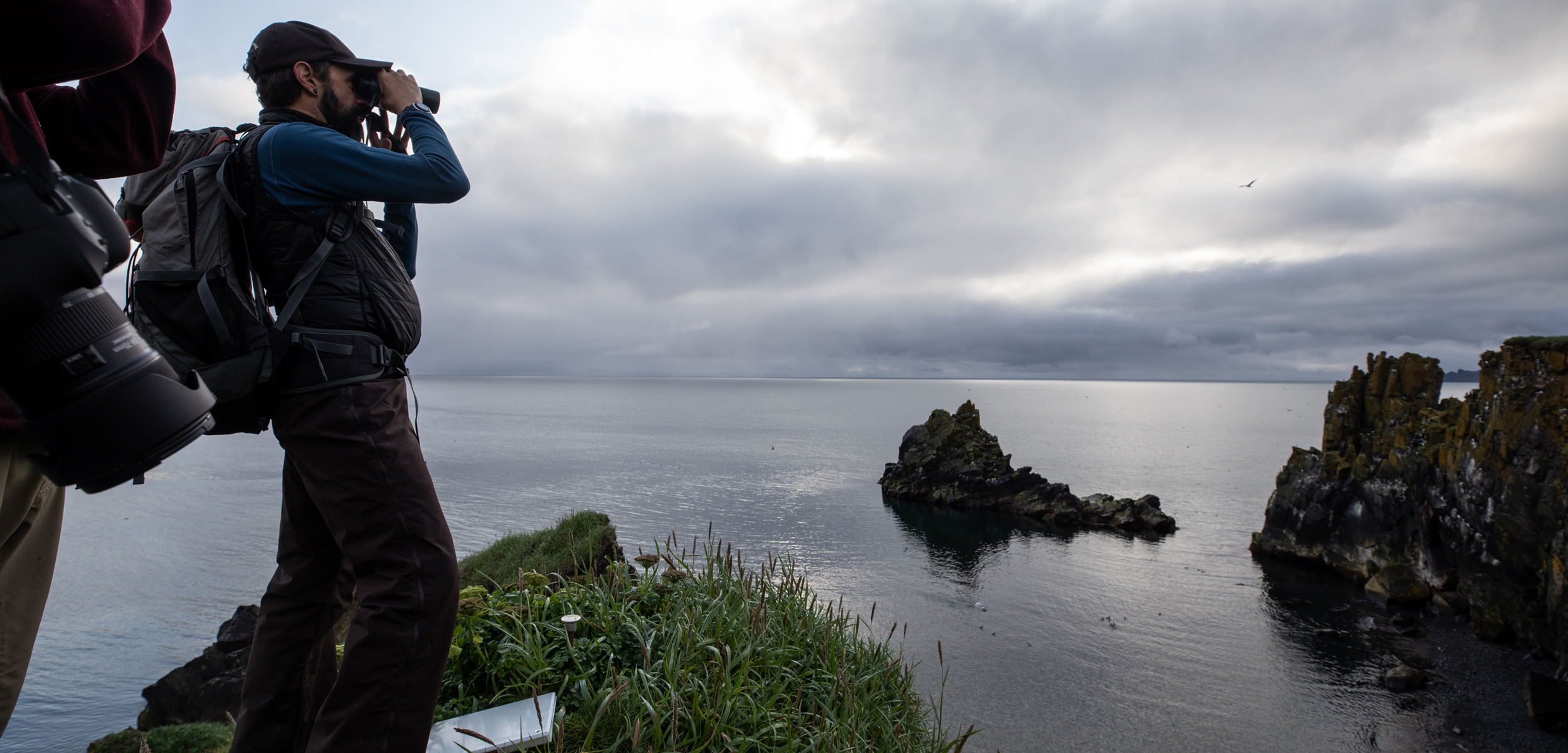 Marc Romano scans for seabirds near St. Matthew Island