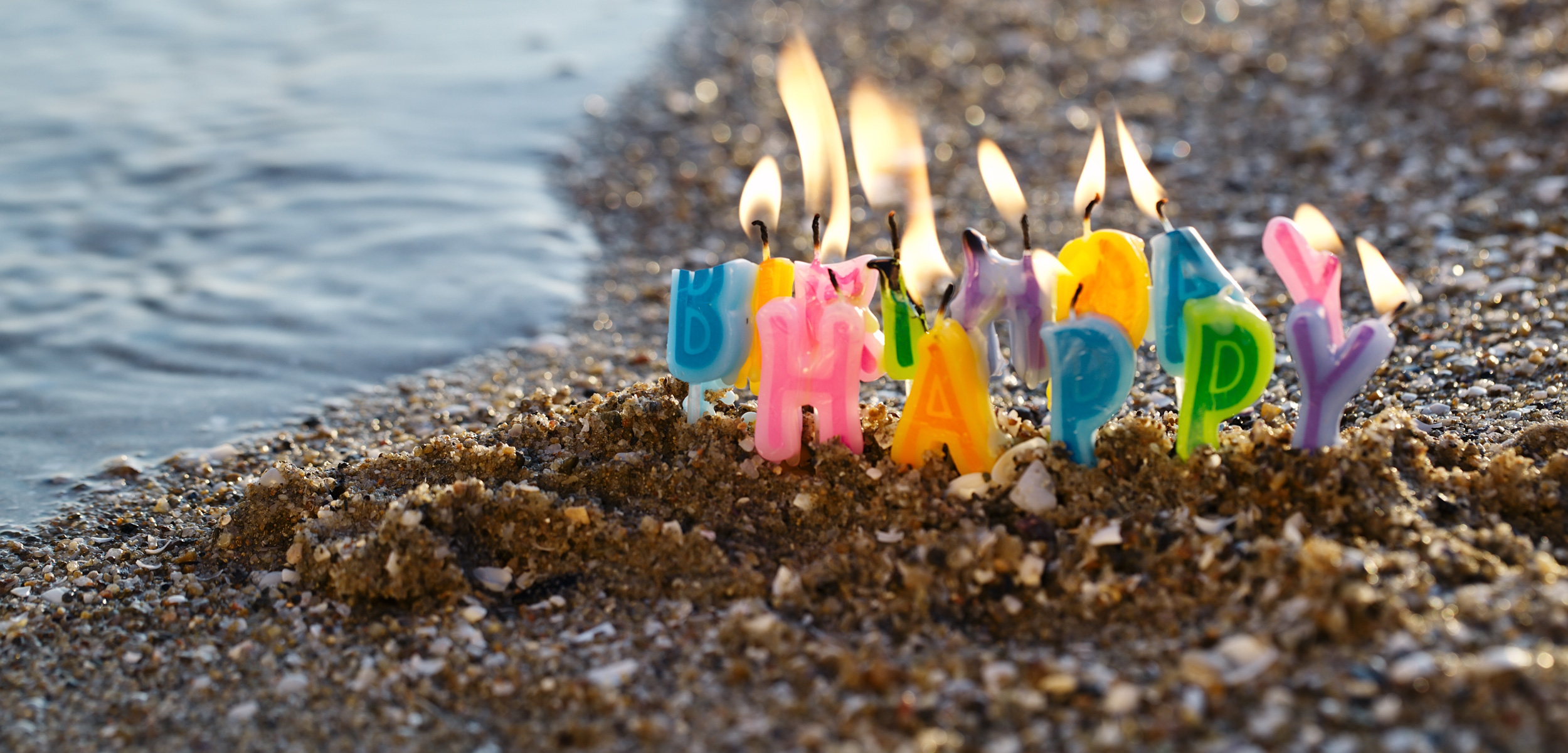 birthday candles on the beach