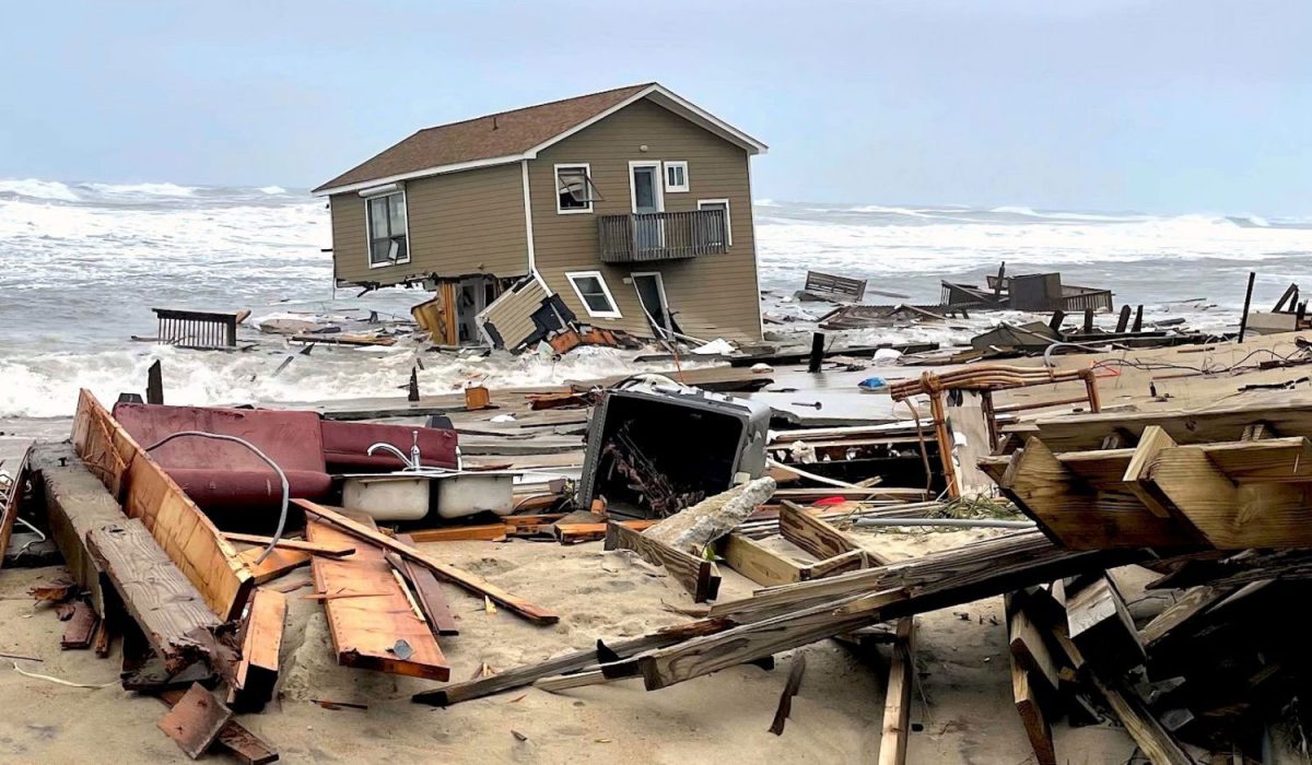 A house in Rodanthe, North Carolina, crumbles into the waves during a May 2022 storm