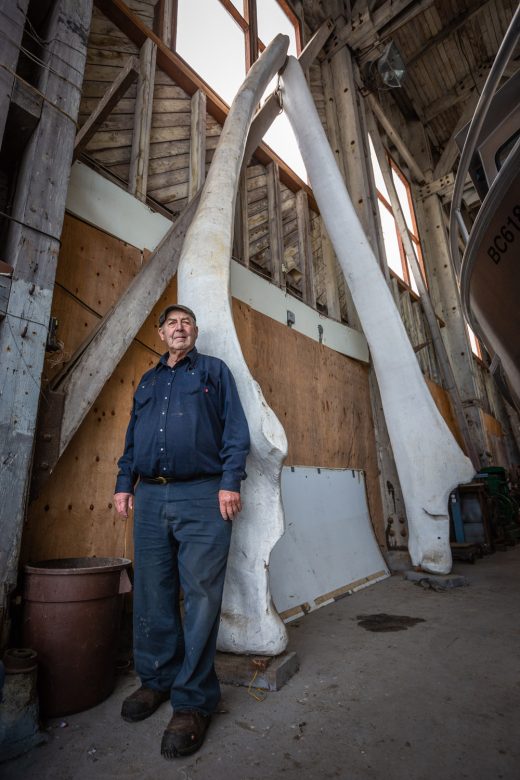 Harry Hole standing beneath blue whale jaw bones