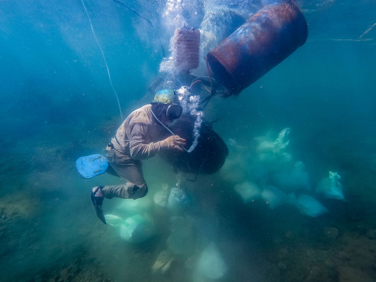 underwater gold miner in the Philippines