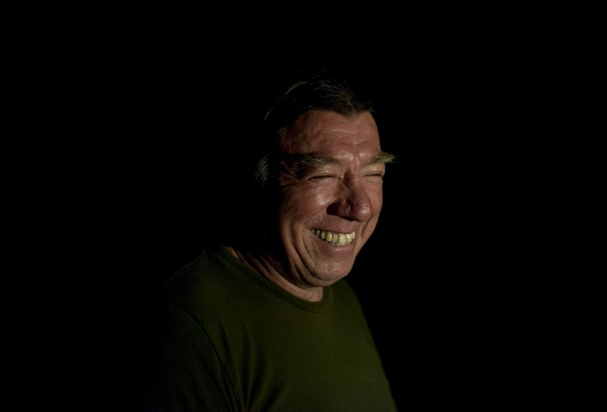 nighttime portrait of Kerry Prosper during an eel fishing trip
