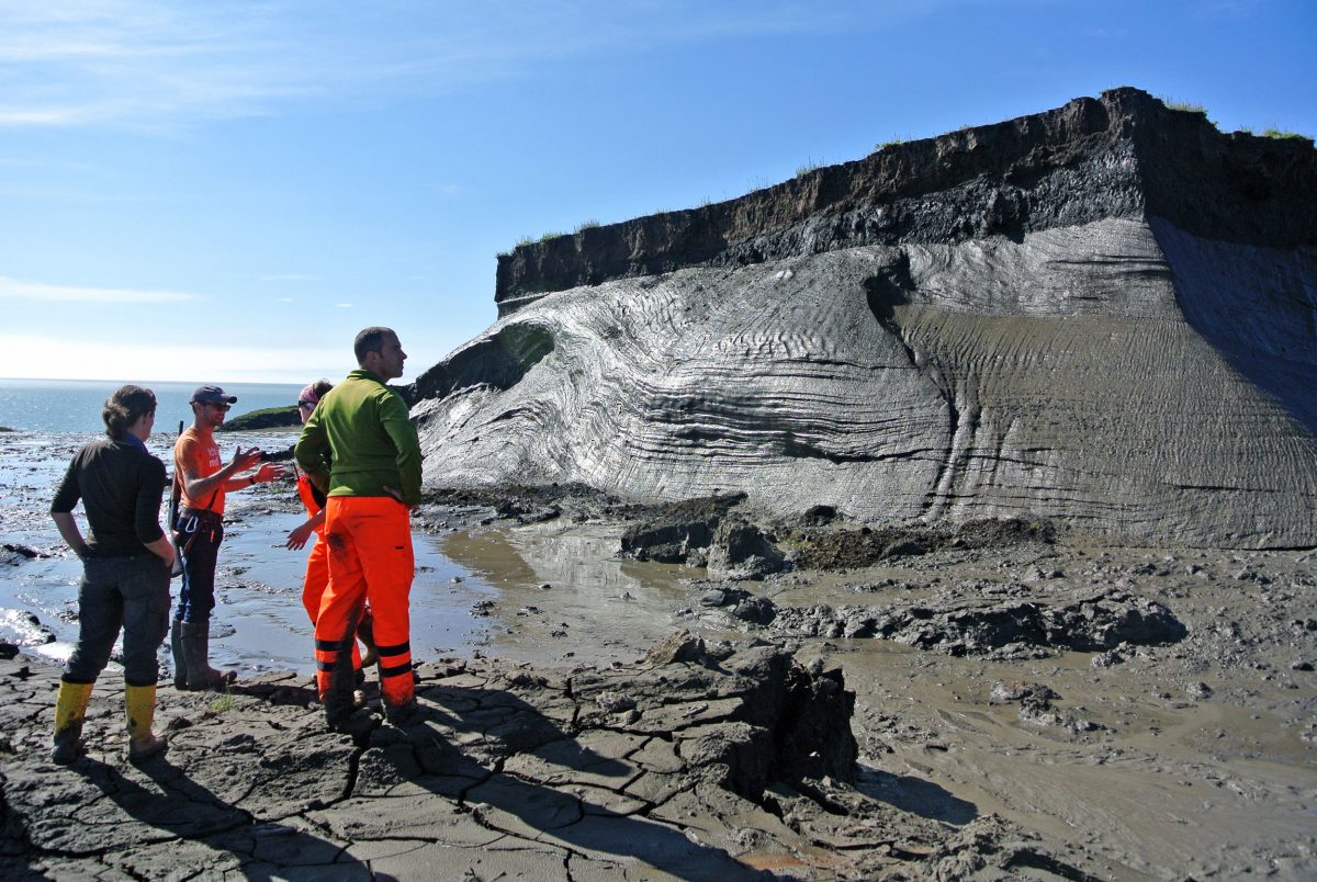 researchers examine permafrost slump
