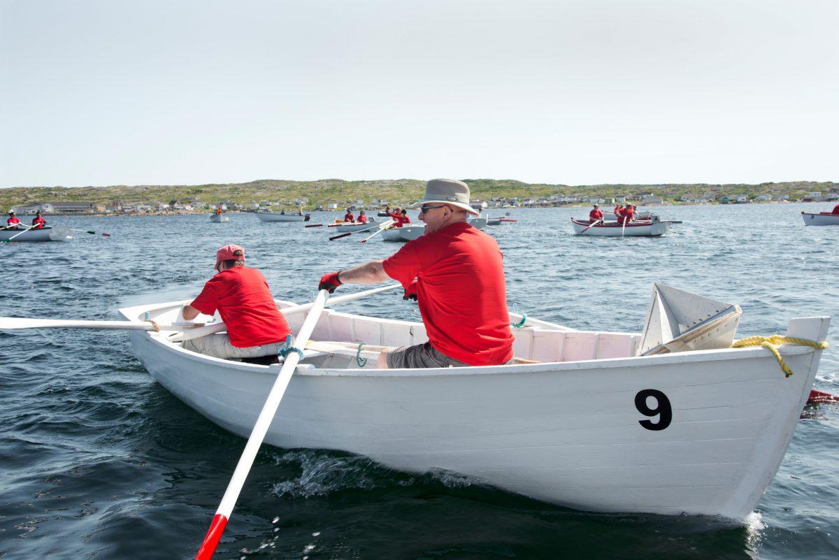Racers navigate to the starting line during the Great Fogo Island Punt Race To There and Back. Photo by Shanna Baker