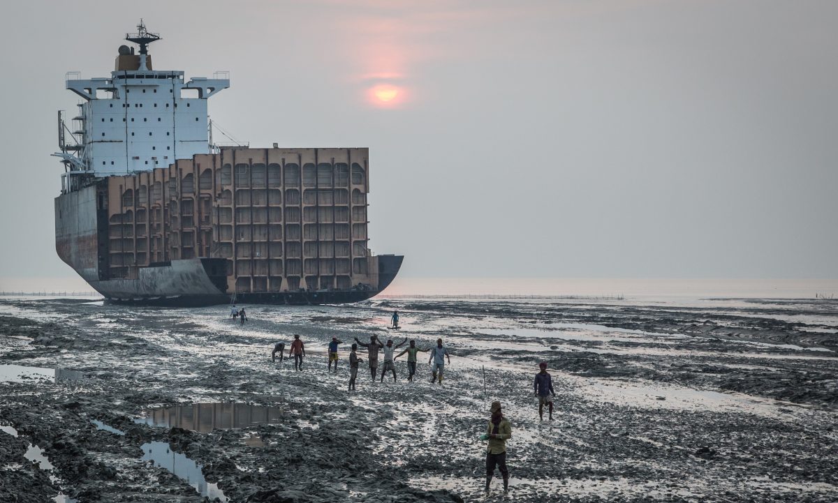 workers returning from a big ocean ship that is being broken down, Chitagong, Bangladesh
