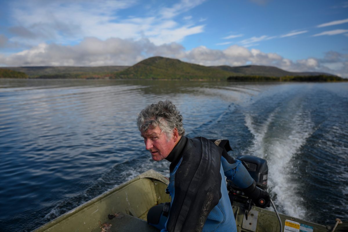 Robin Stuart, an aquaculture consultant who contributes to Beresford’s research, navigates to a test site on Bras d’Or Lake.