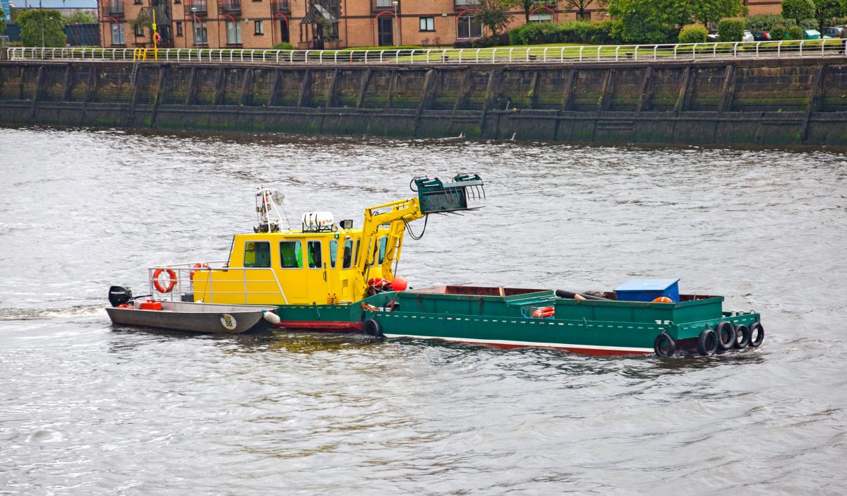 'Water Witch' vessel which cleans debris brought to the River Clyde in Glasgow