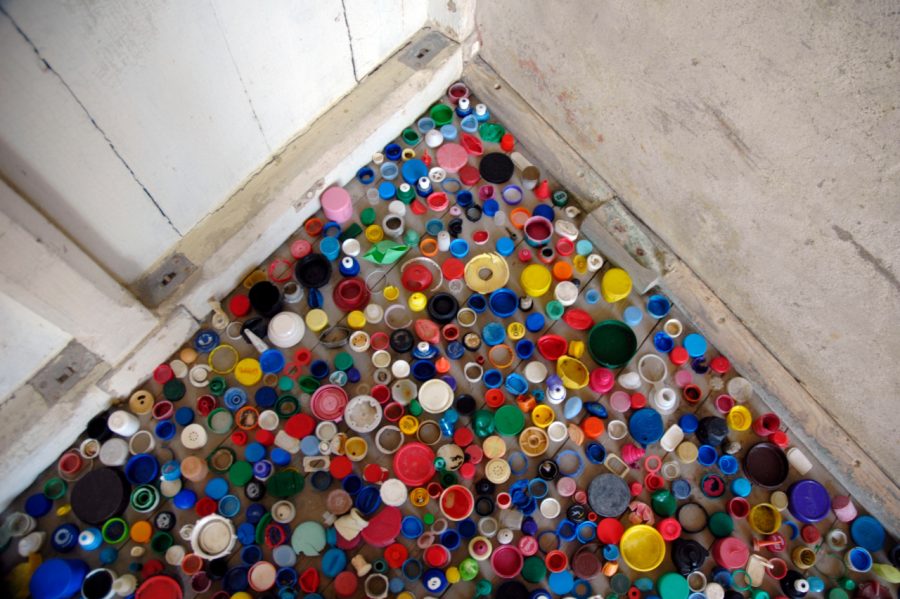 This view from above shows a portion of the thousands of bottle tops artist Fran Crowe used for an installation, shaped like a wave, at a local fort. Photo courtesy of Fran Crowe